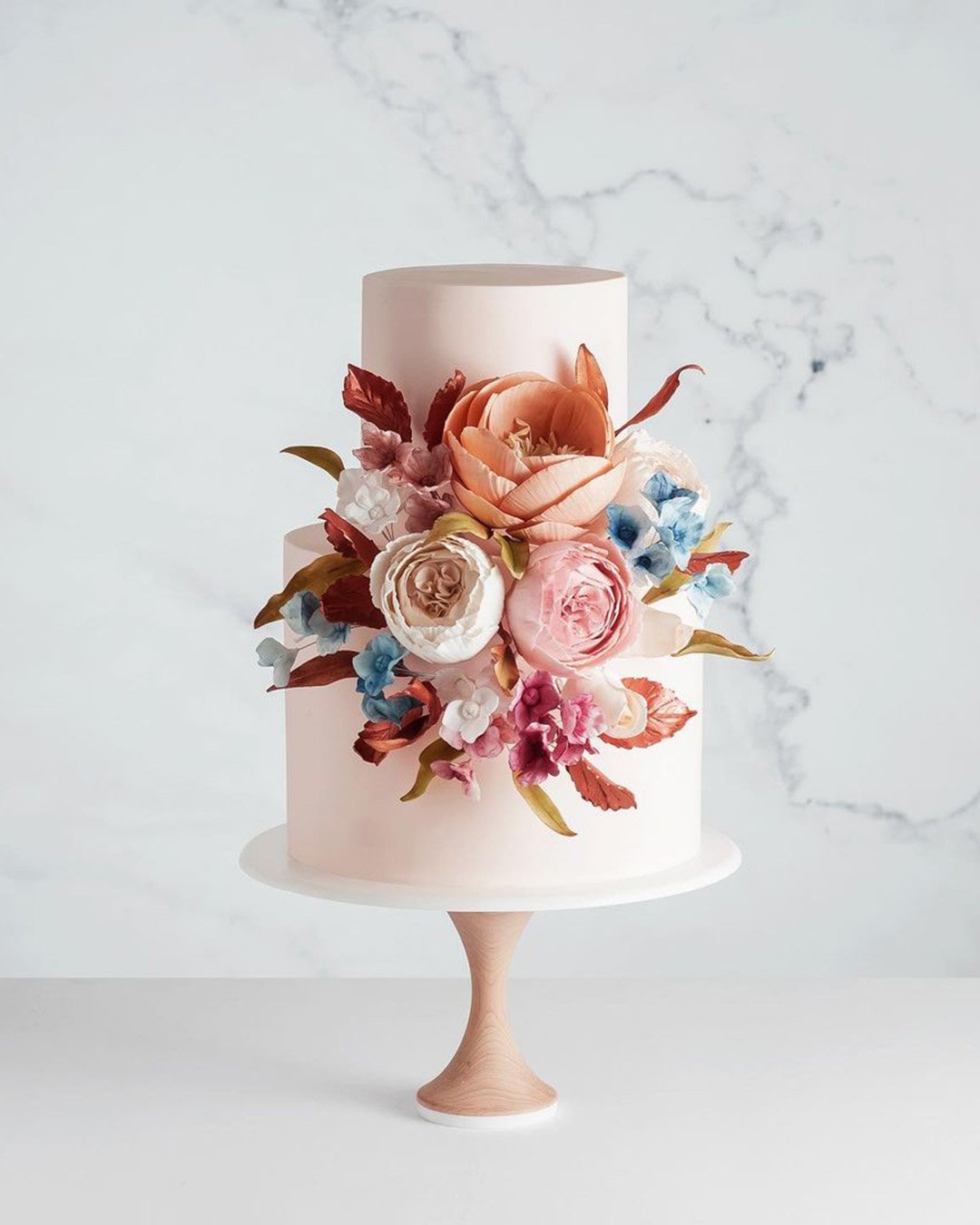 wedding cake designers pink small with flowers cake_ink