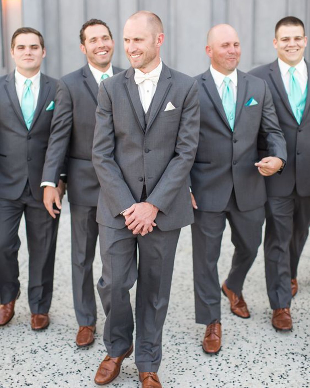 groomsmen attire grey jacket with turguoise tie shaunaandjordon