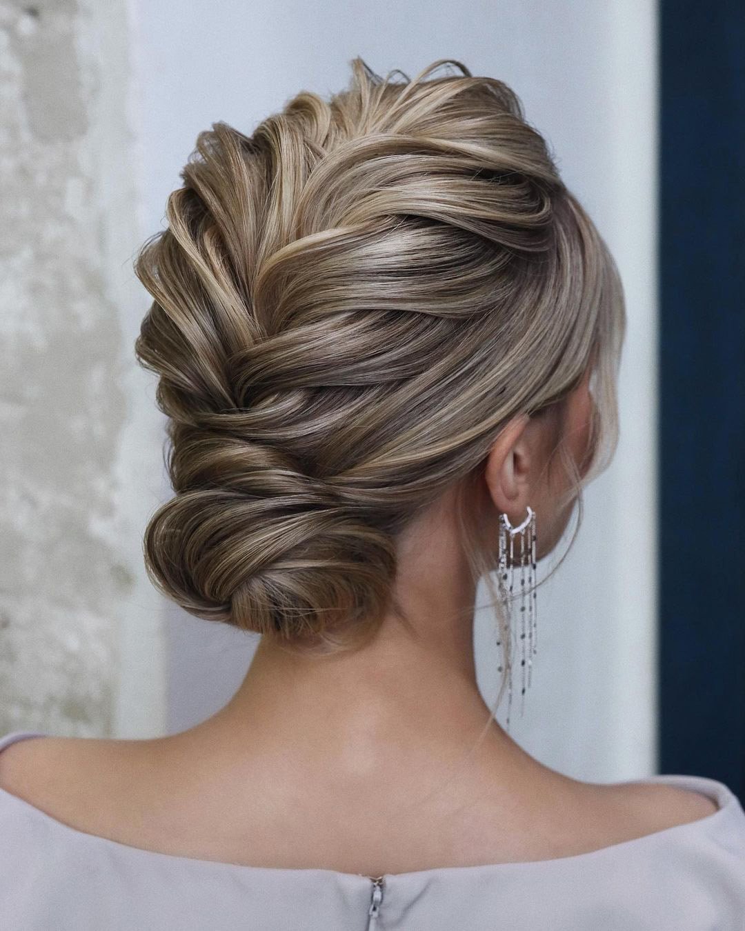 braided wedding hair low bun with french braid texture tonyastylist