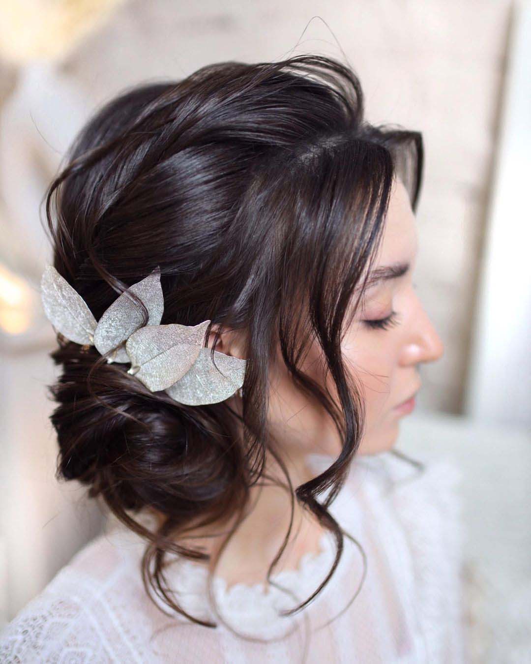wedding hairstyles for heart face side bun with loose curls hair_vera