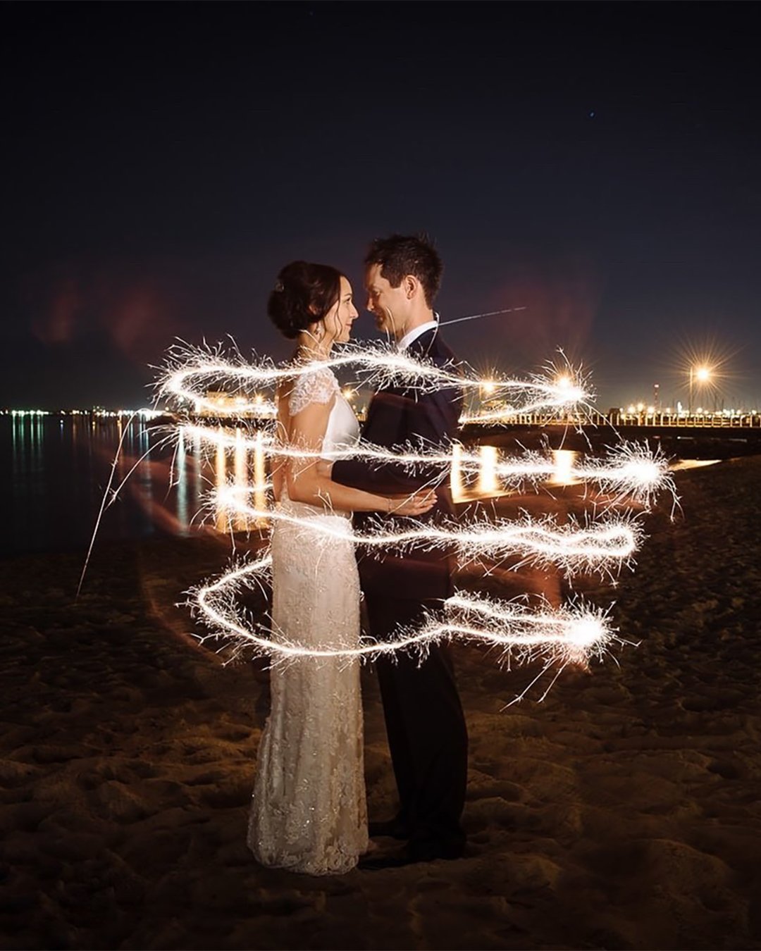popular wedding photo ideas couple in fireworks jeromecole
