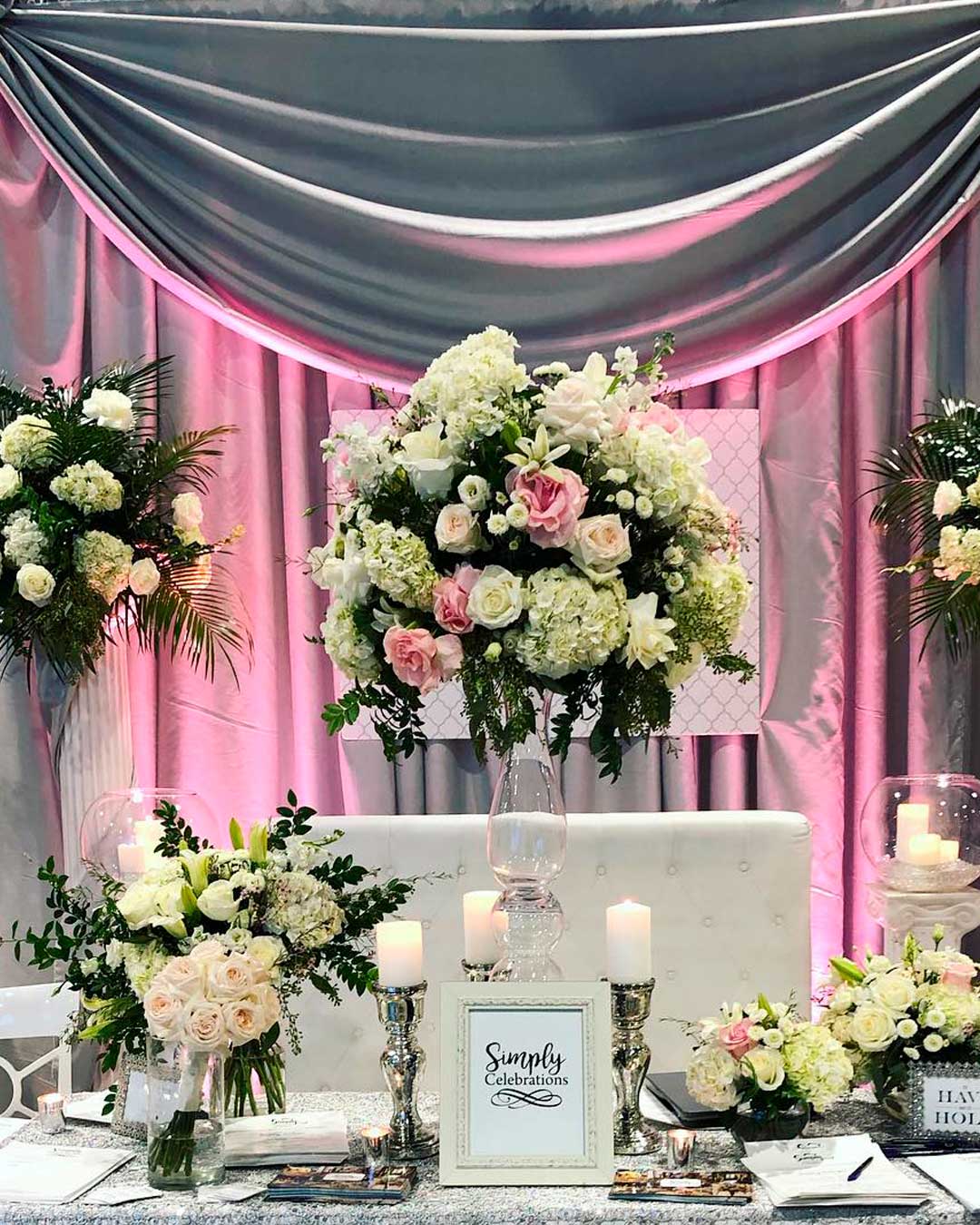 bridal expo flowers candles centerpieces