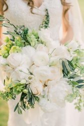 sage green wedding bouquet with greenery and white flowers tictockflorals