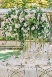 sage green wedding tall centerpiece with roses tictockflorals