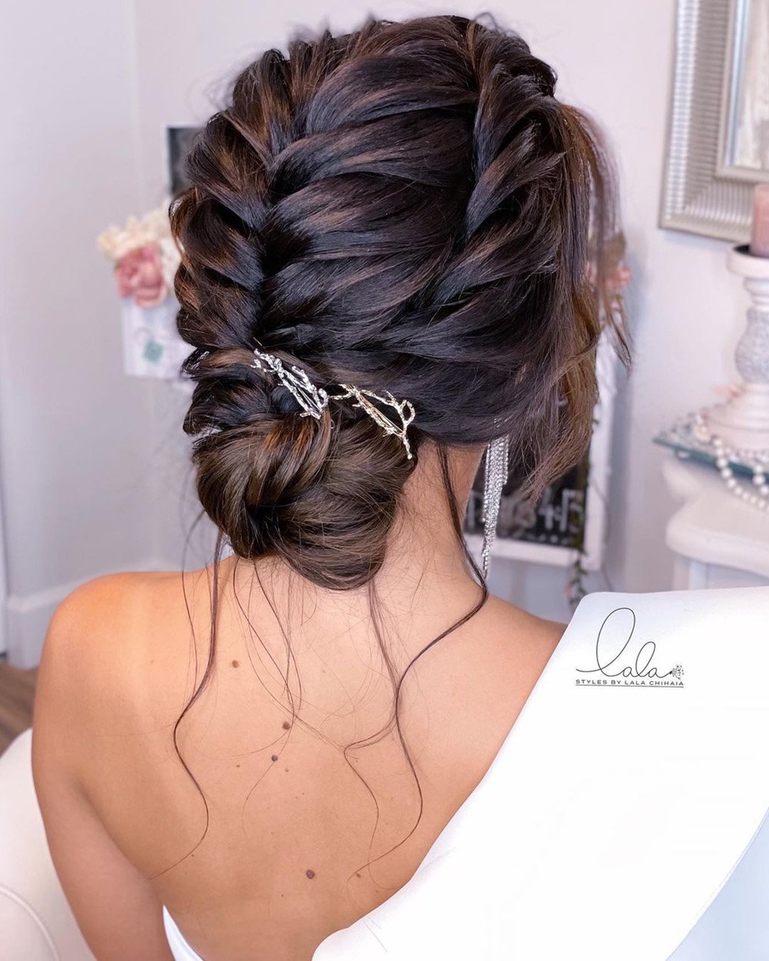 wedding updos with braids low bun with texture on brown hair lalasupdos