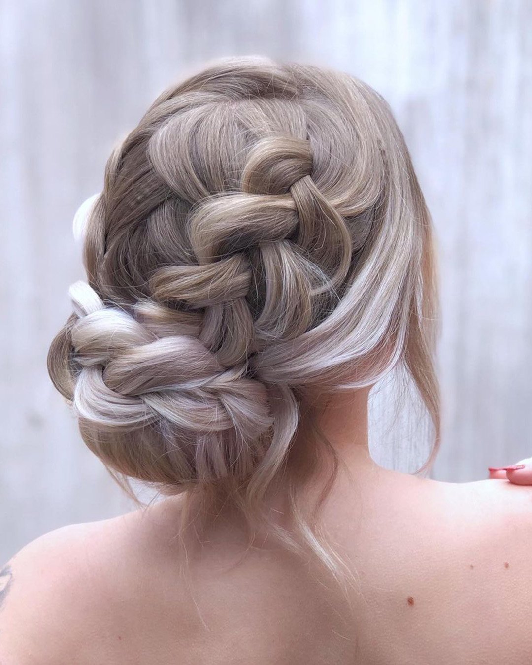bridesmaid hairstyles wedding hair low bun with braids natalymirandahair