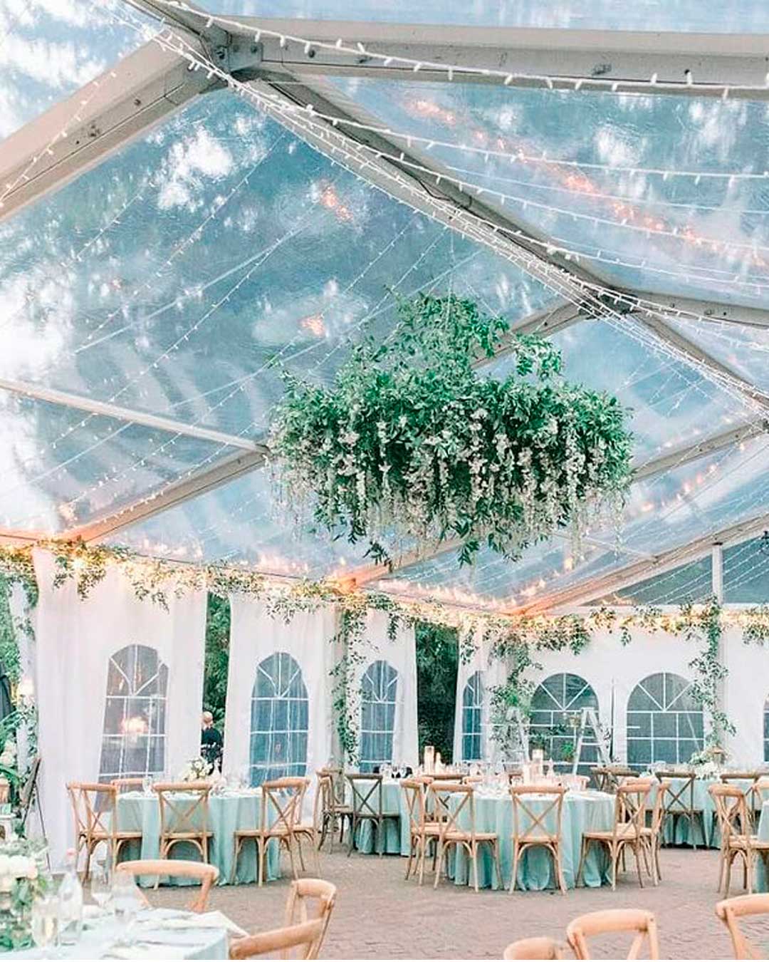 rustic wedding venue outdoor tent greenery