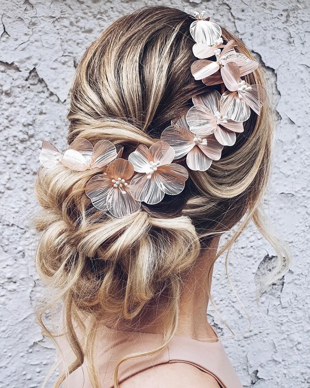 wedding hairstyles for thin hair messy bun with pink flower vine hairbyhannahtaylor
