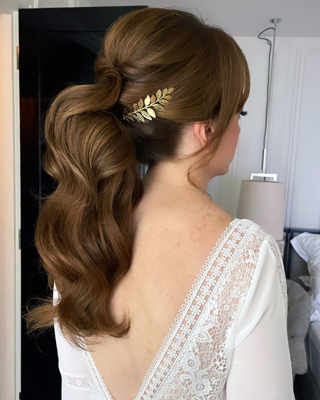 pony tail hairstyles for wedding high textured with golden pin botiashairandmakeup