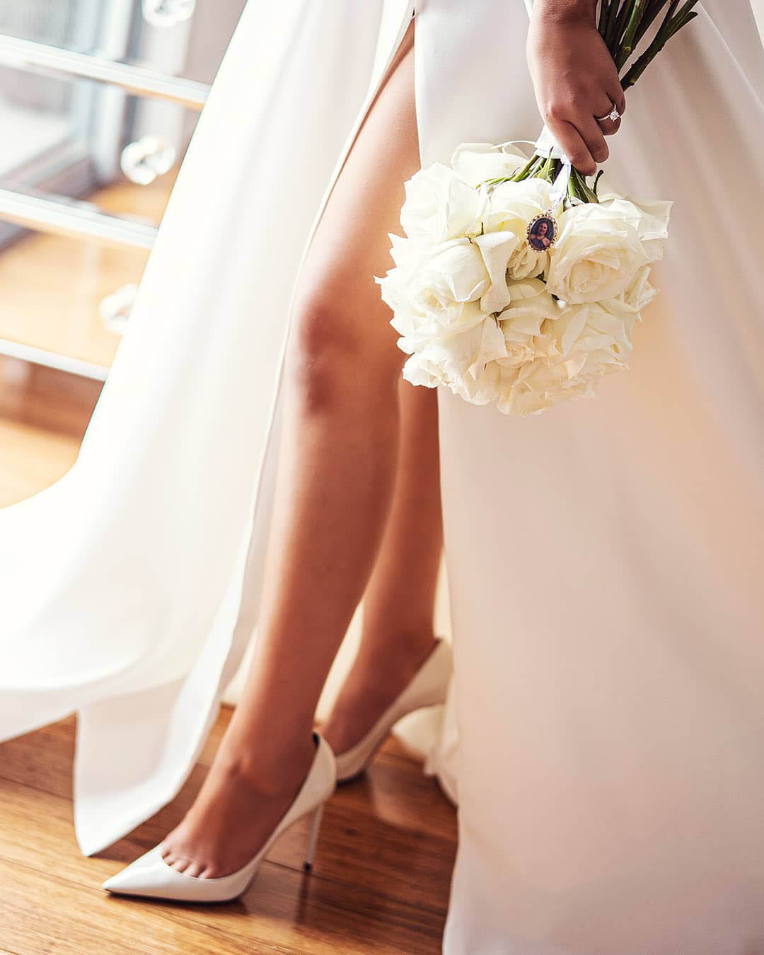 sexy wedding pictures bridea legs with bouquet michalkrieschstudios