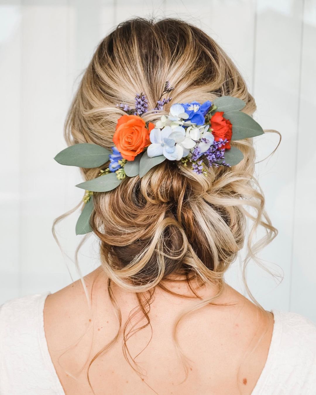 wedding hair accessories slightly messy updo with flowers reneemarieacademy