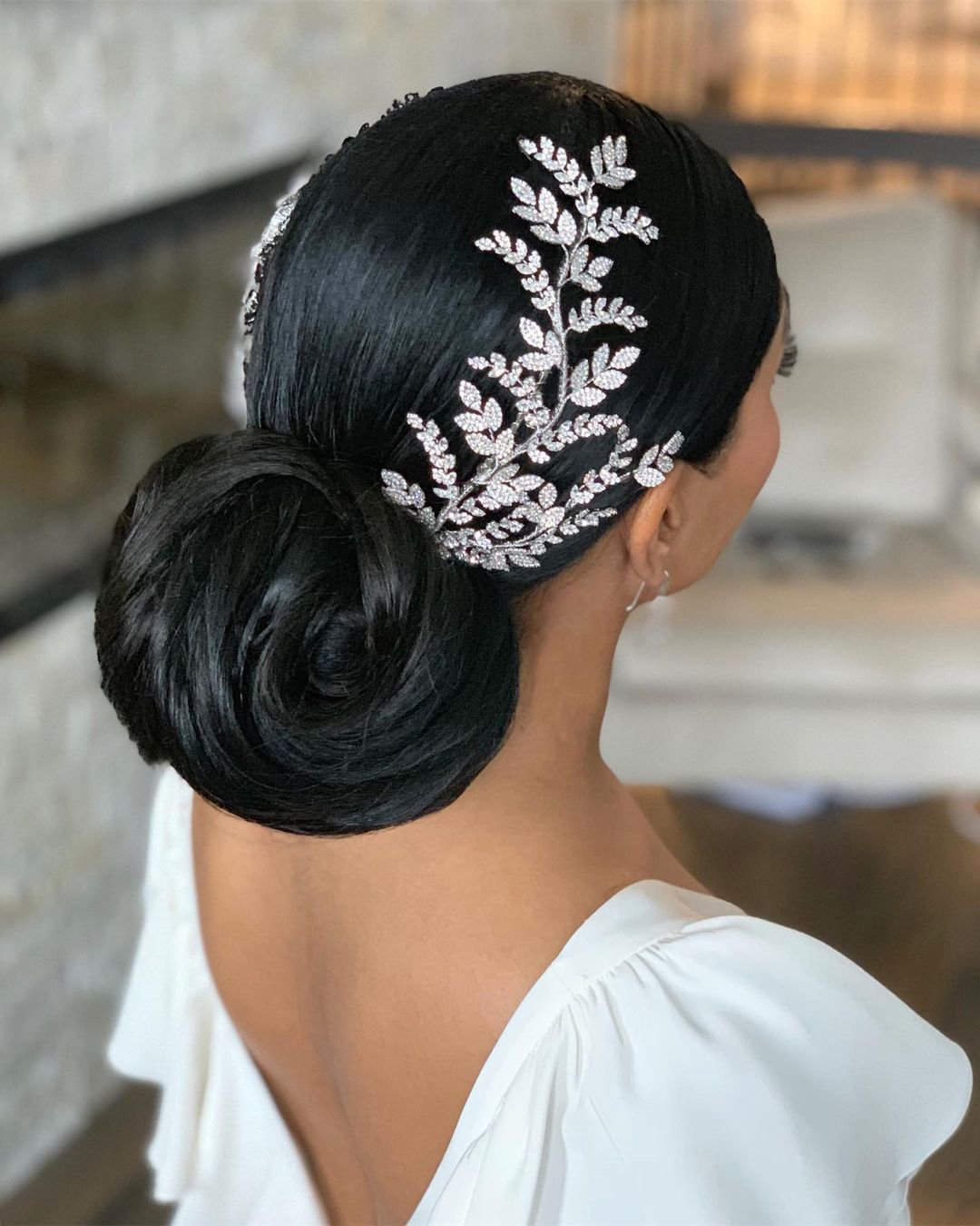 black women wedding hairstyles volume low bun with hair vine bridalhaircouturebykatie