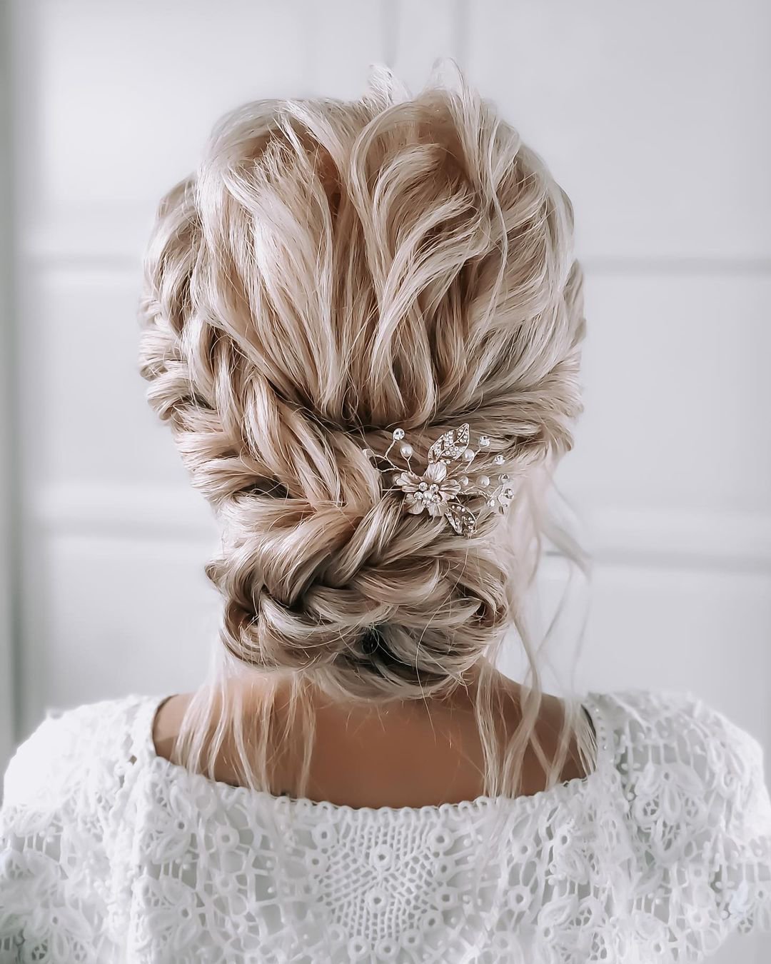 boho wedding hairstyles gentle braided low bun with loose curls mrs_updo