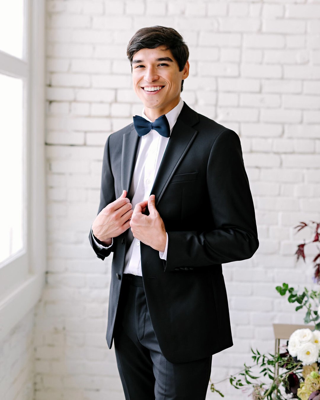 groom suits black jacket with bow tie revelry