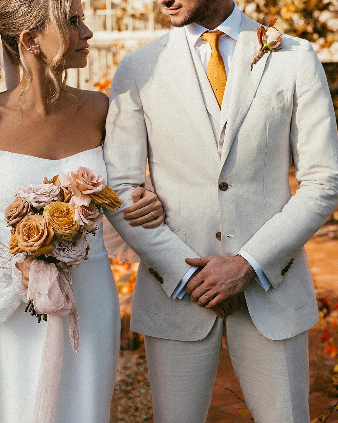 groom suits grey jacket with tie and bouttonieres chelseawhitephotog