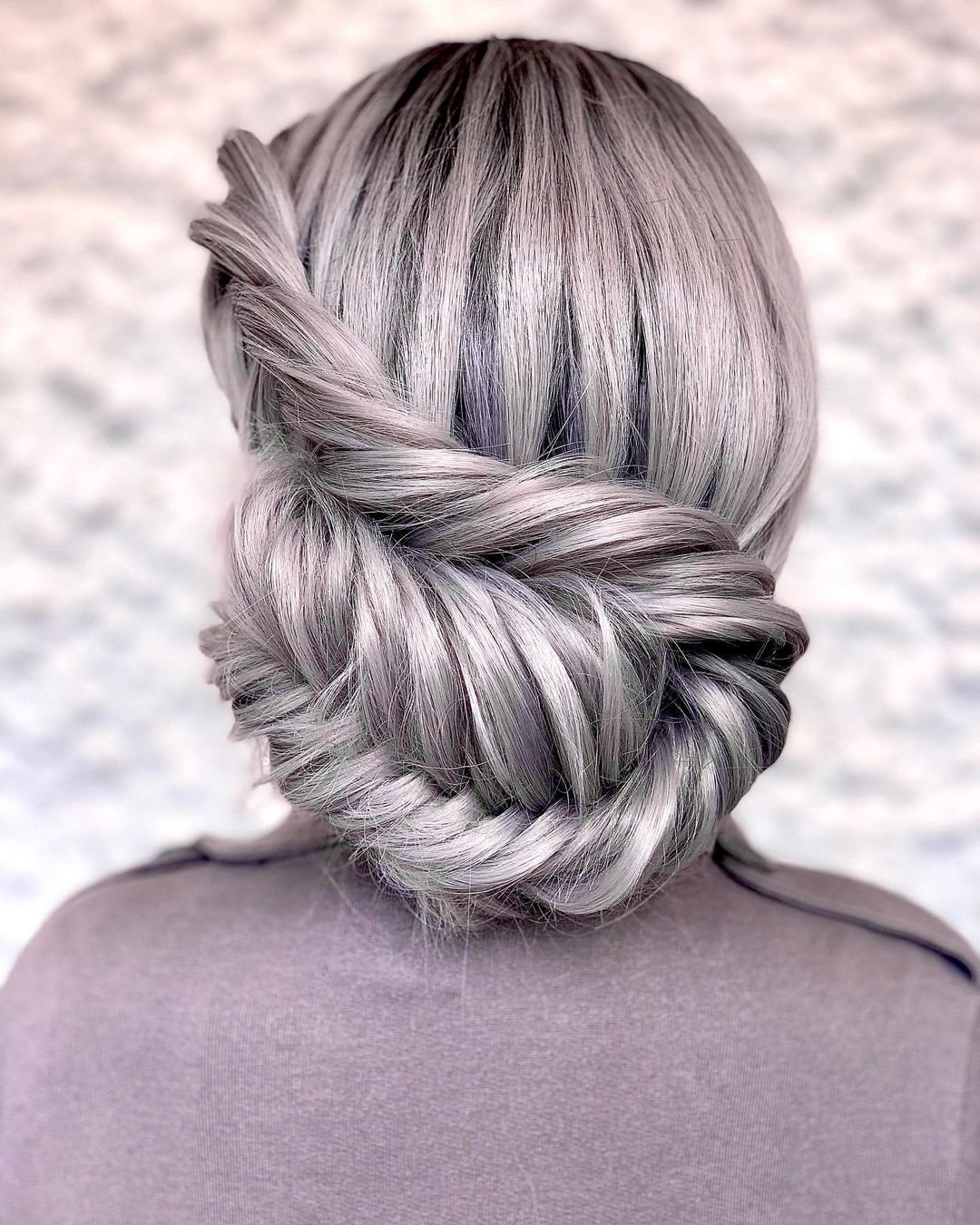 mother of the bride hairstyles braided texture updo clairehartleystylist