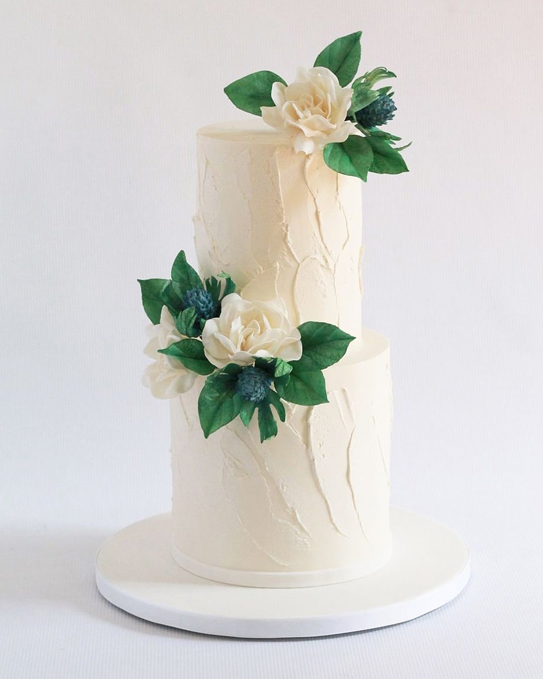 romantic wedding wedding cake floral greenery
