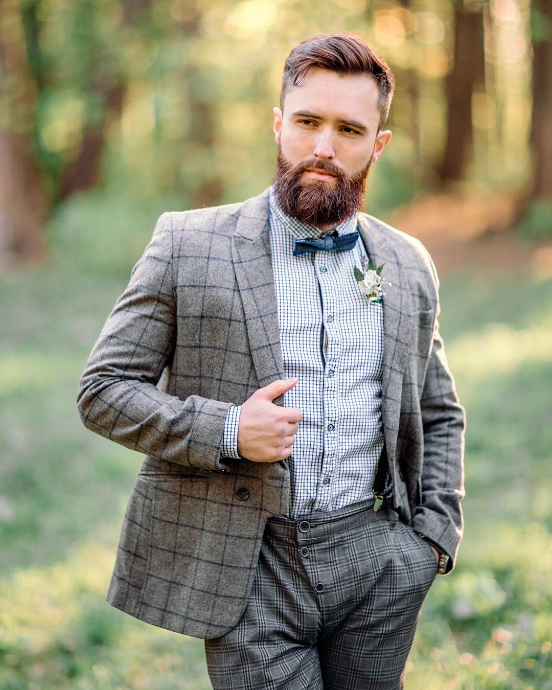 rustic groom attire jacket with plaid bouttoniere shutterstock