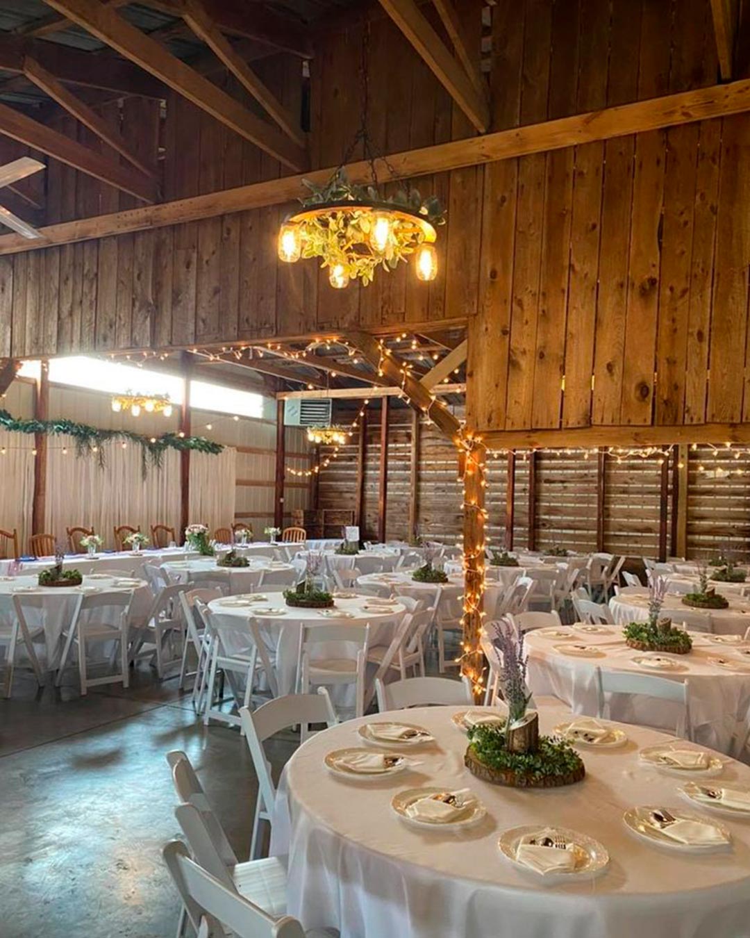 rustic wedding venue in michigan barn indoor decor lights