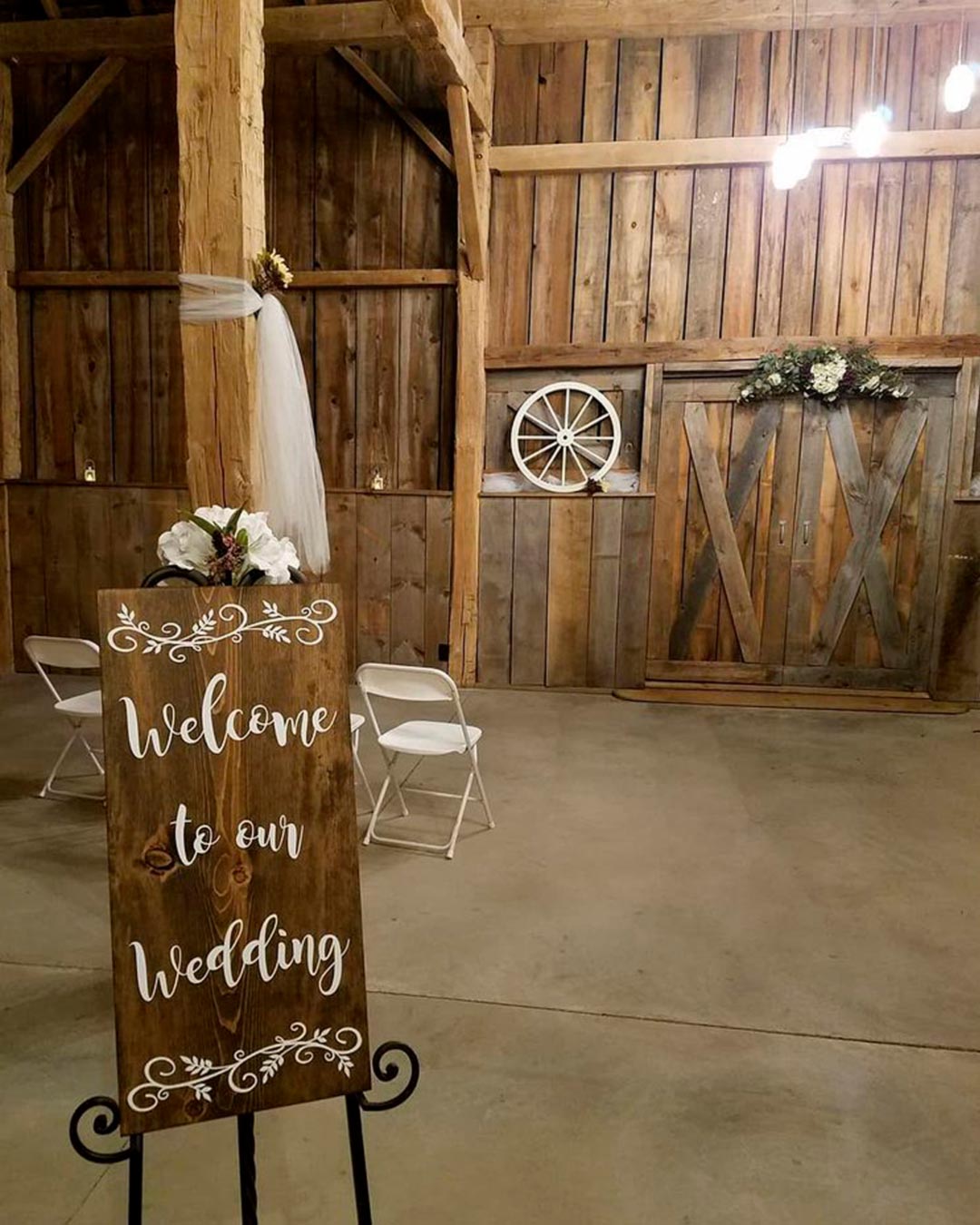rustic wedding venue in michigan barn indoor sign