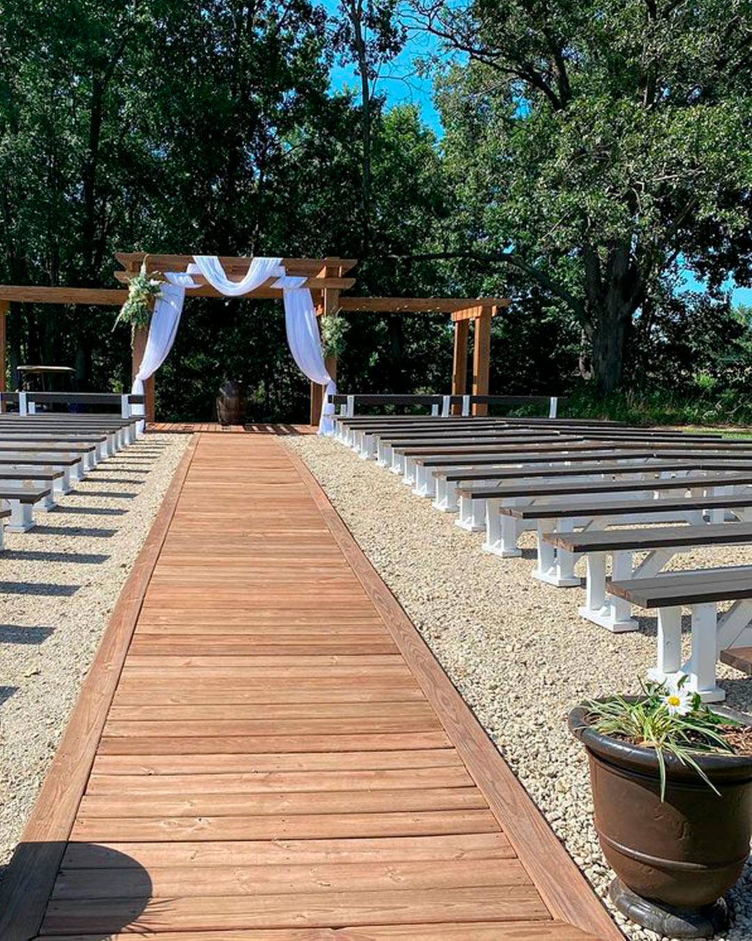 rustic wedding venue in michigan outdoor aisle wooden