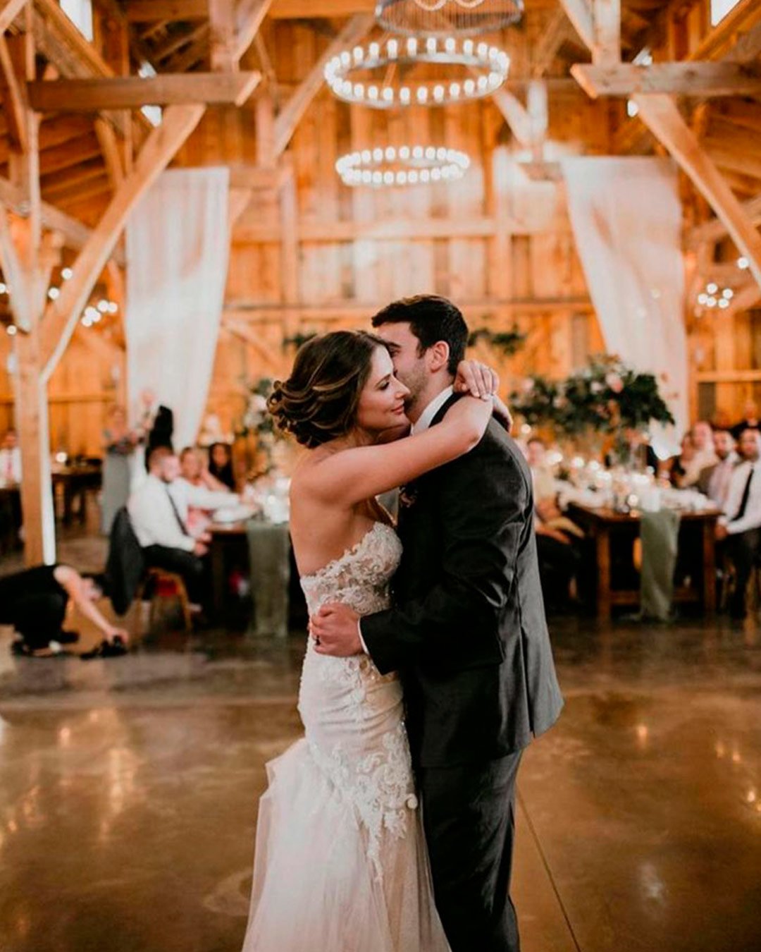 rustic wedding venues in new york barn lights indoor bride groom