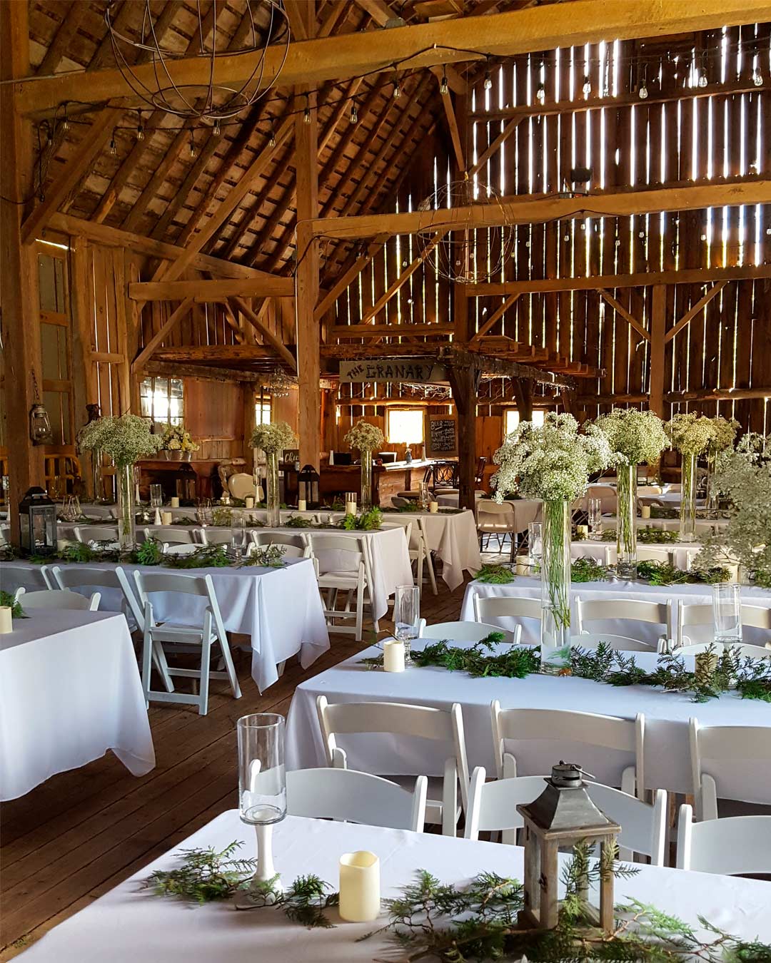 rustic wedding venues in wi aisle hall indoor table Orchard Valley Acres