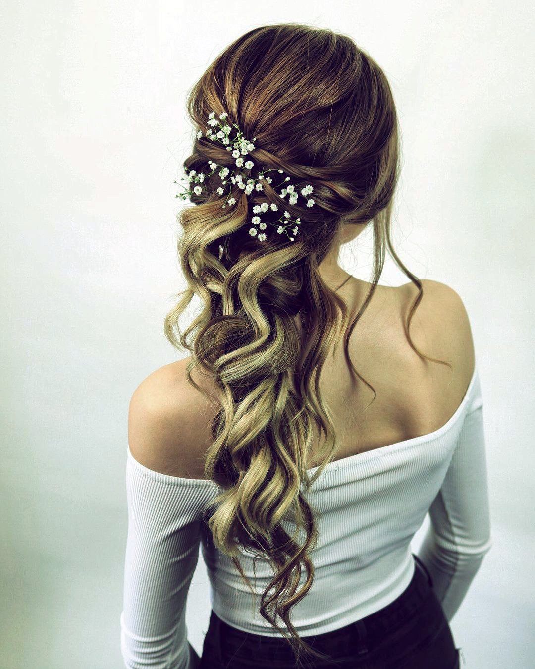 wedding hairstyles for curly hair cascading with loose curls down sweethearts_hair