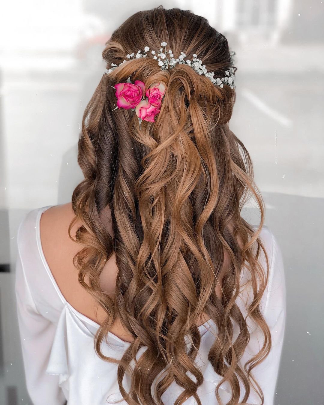 wedding hairstyles with flowers wavy half up with roses reneemarieacademy