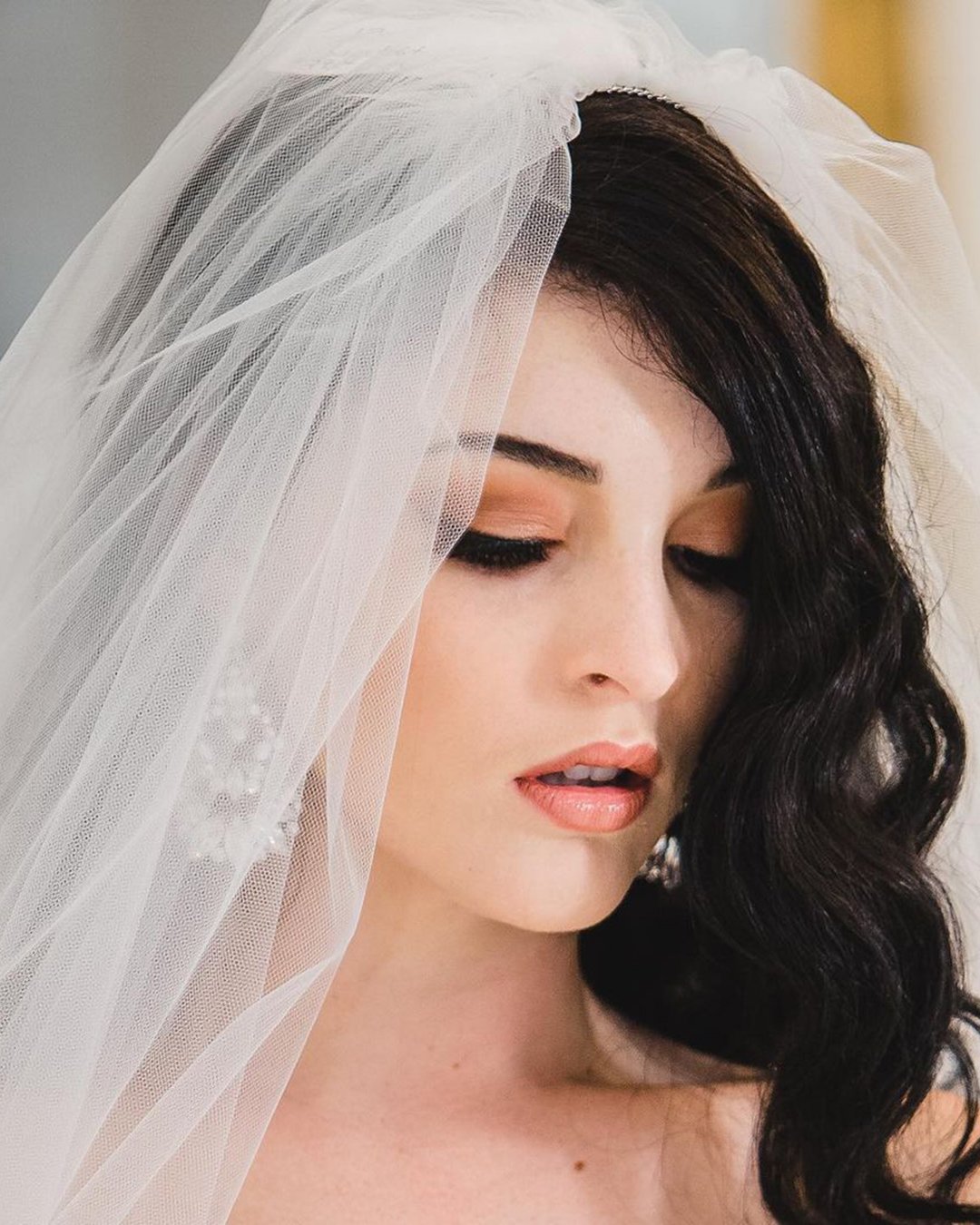 wedding hairstyles with veil high fit on loose curls bridalgal