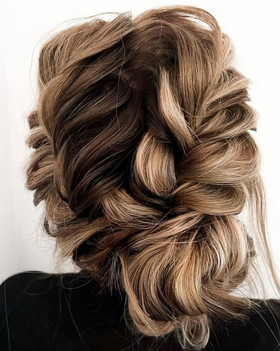 wedding updos with braids slightly messy low side bun with braids svglamour