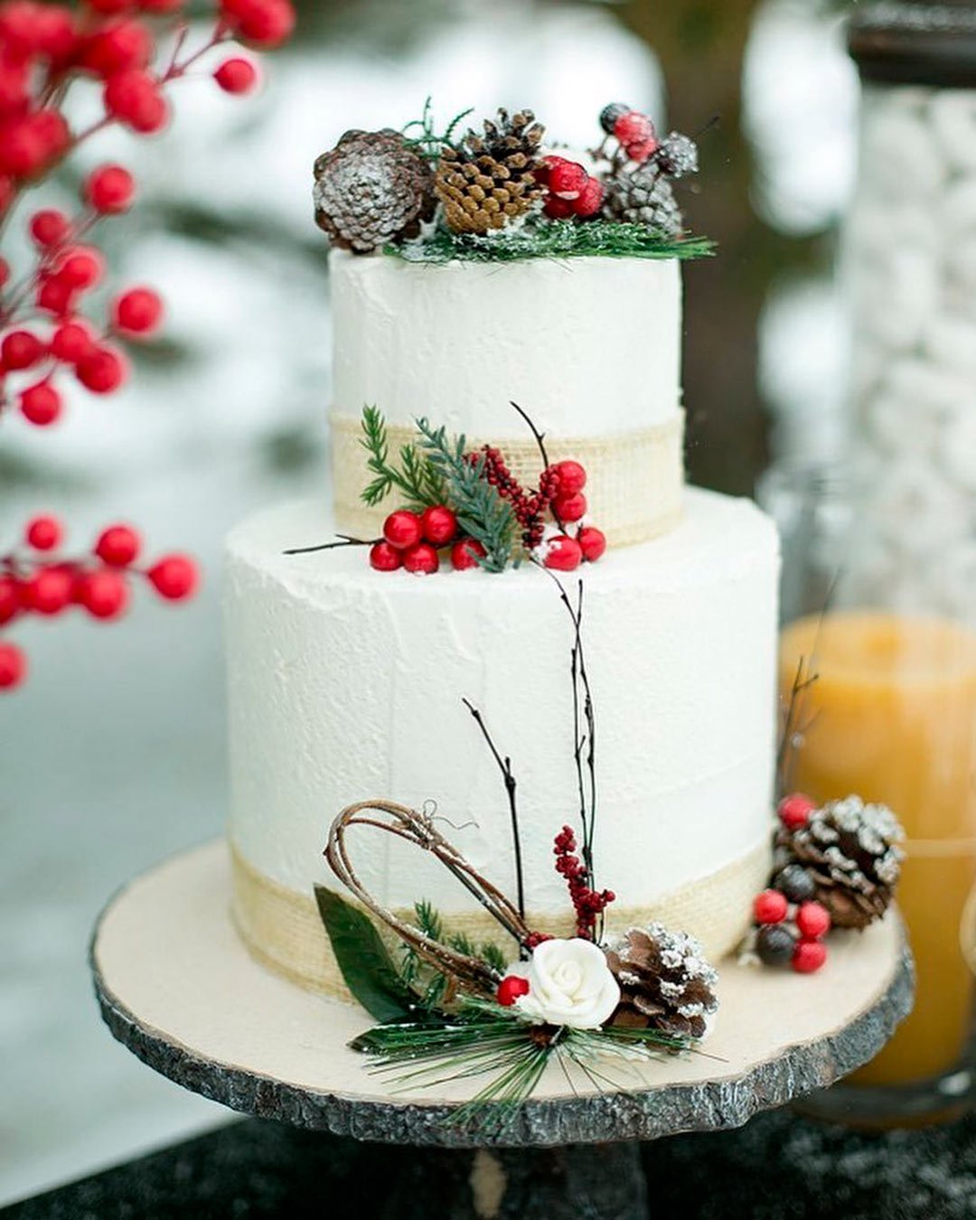 winter wedding decor red white cake cones berries
