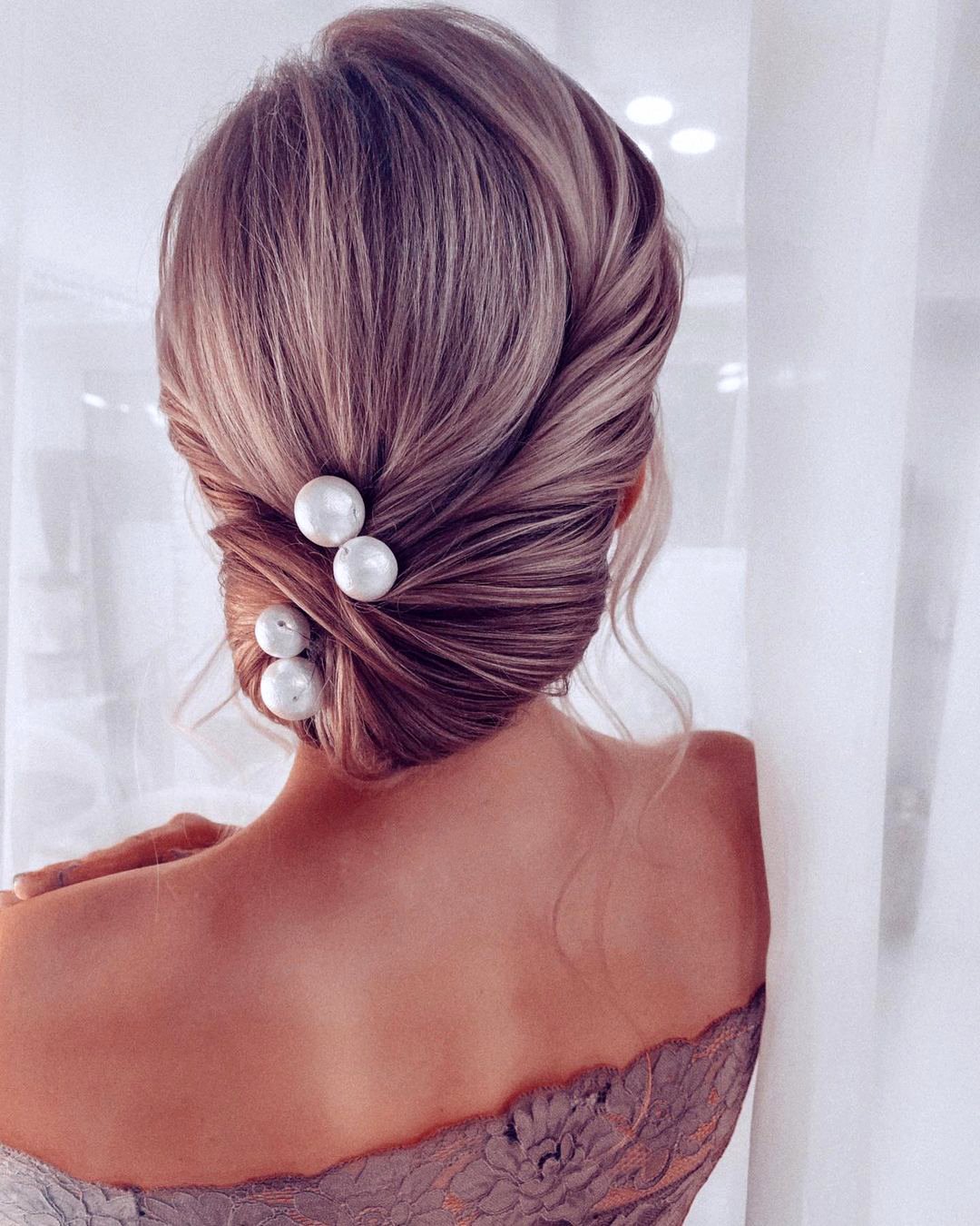 elegant wedding hairstyles elegant low bun with pearls olga_nikiforova_hair