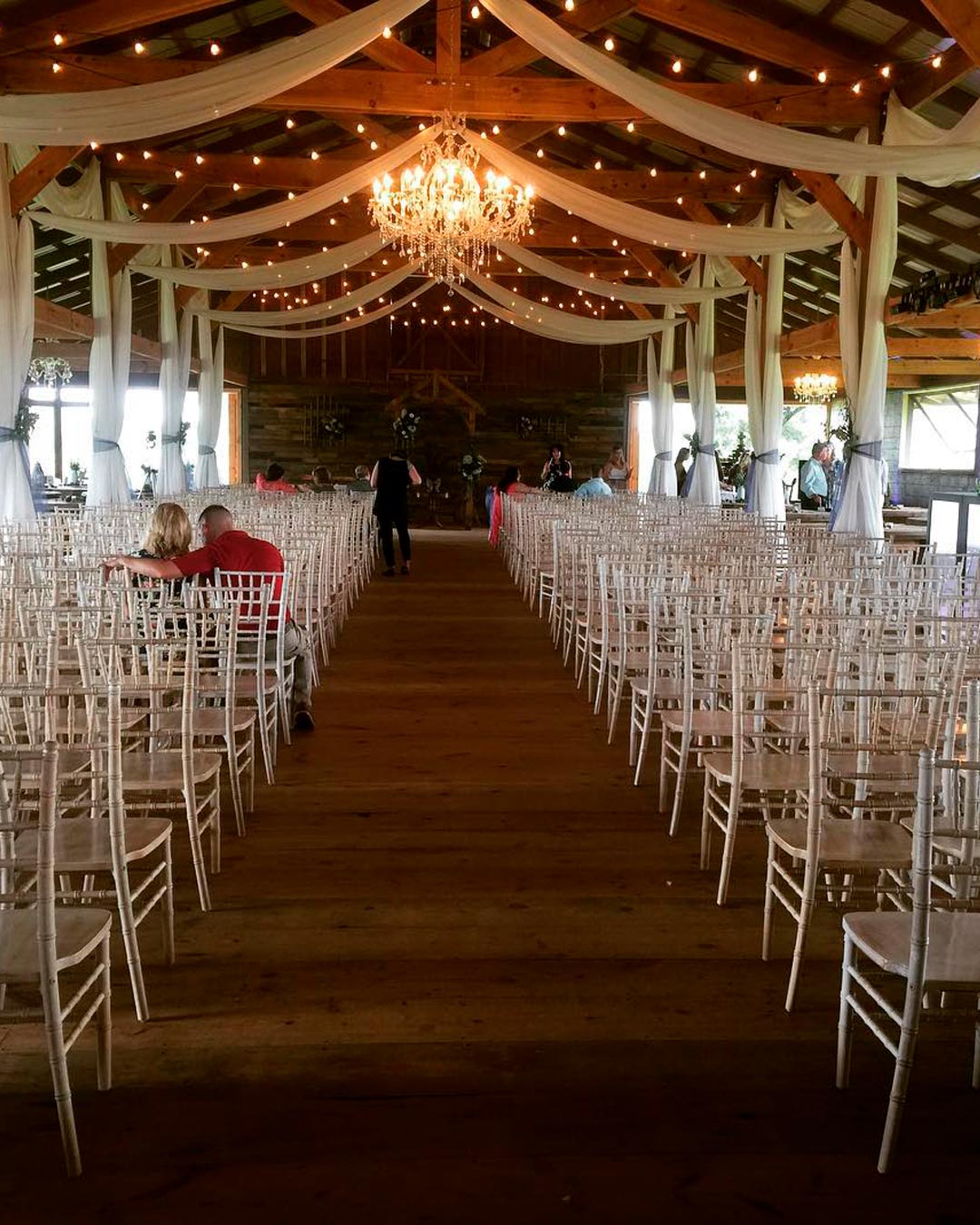 rustic wedding venues in georgia bride groom aisle barn