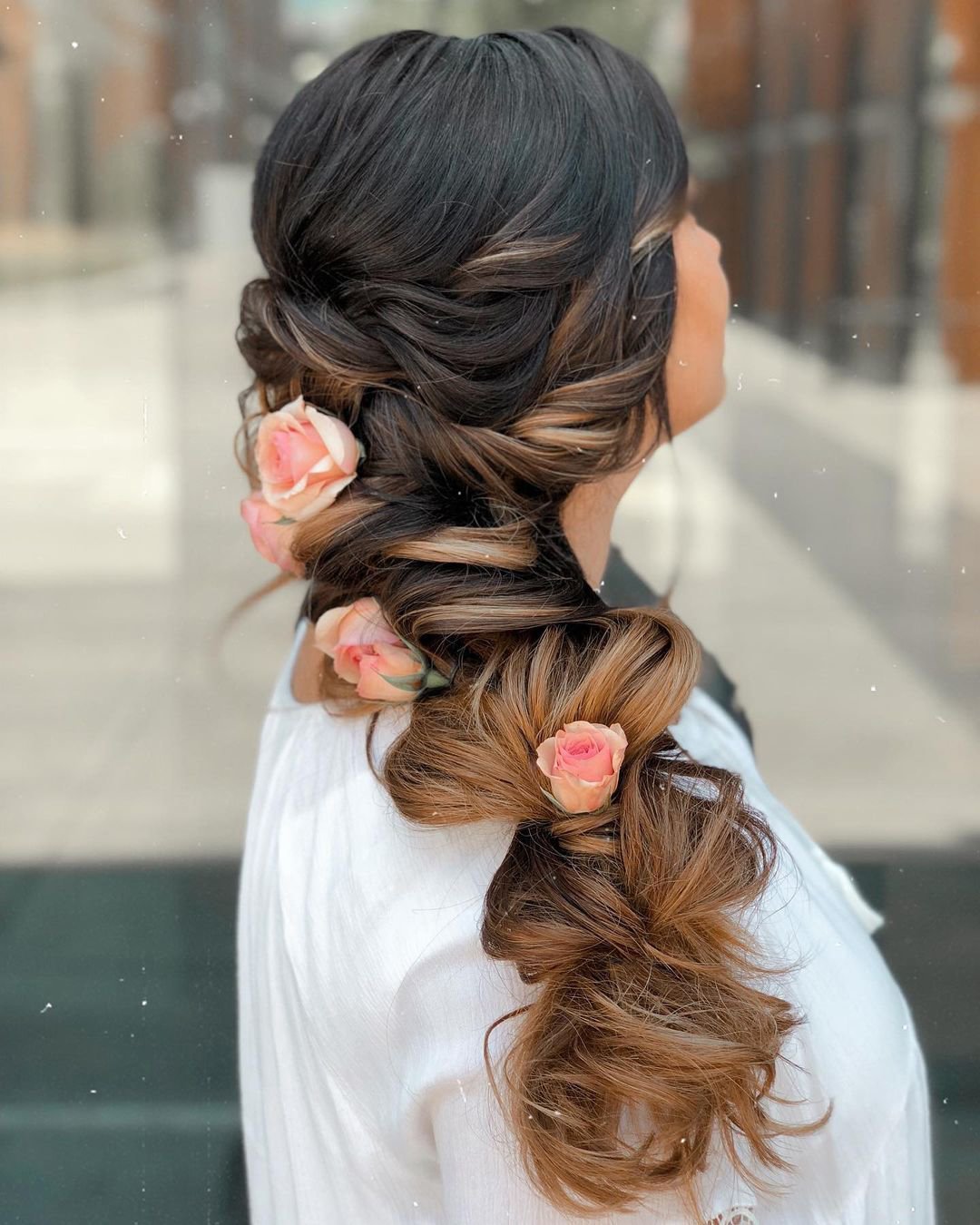 wedding hairstyles for long hair side swept messy braid with flowers reneemarieacademy