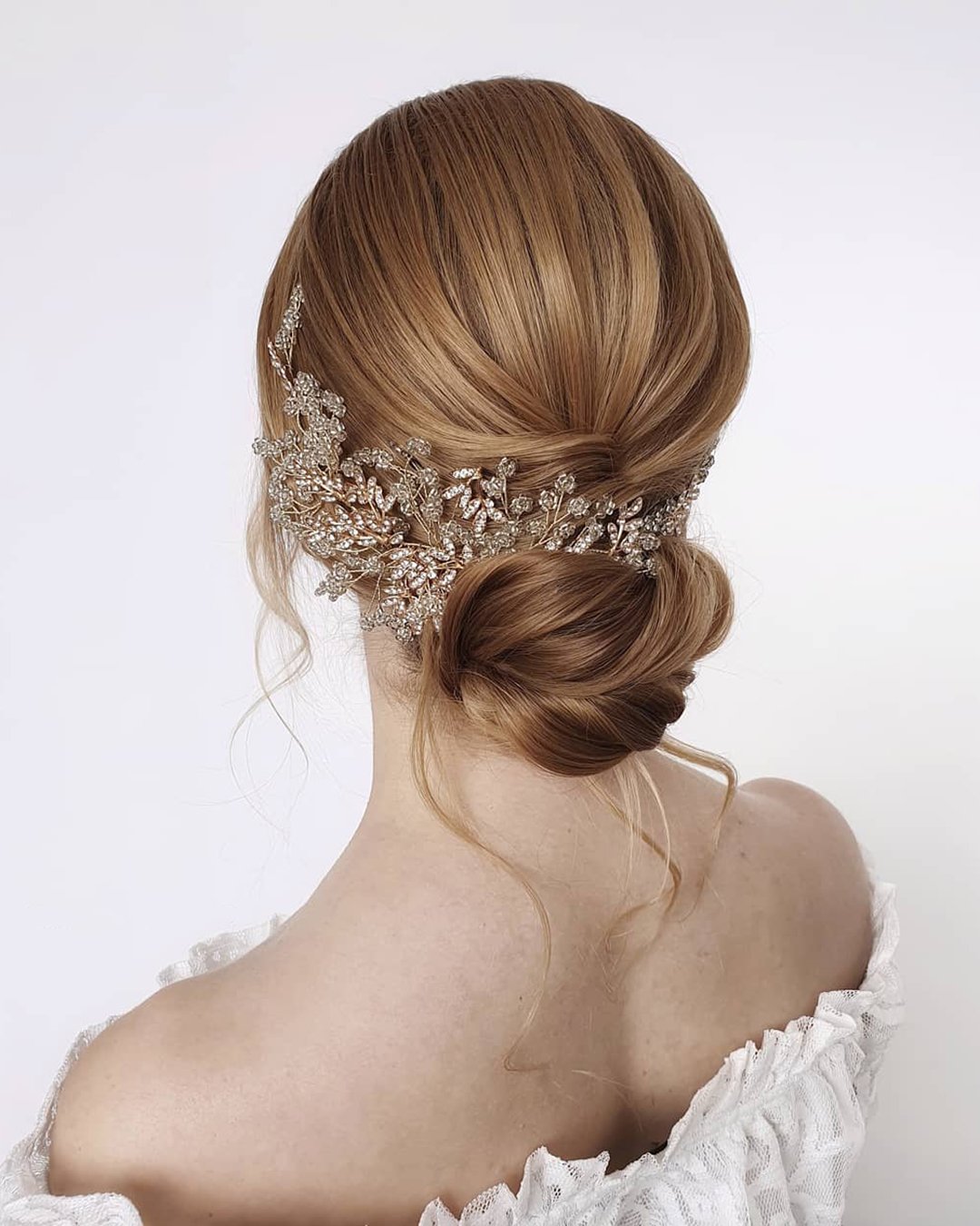 wedding hairstyles for thin hair low bun with crystal hair vine cathughesxo