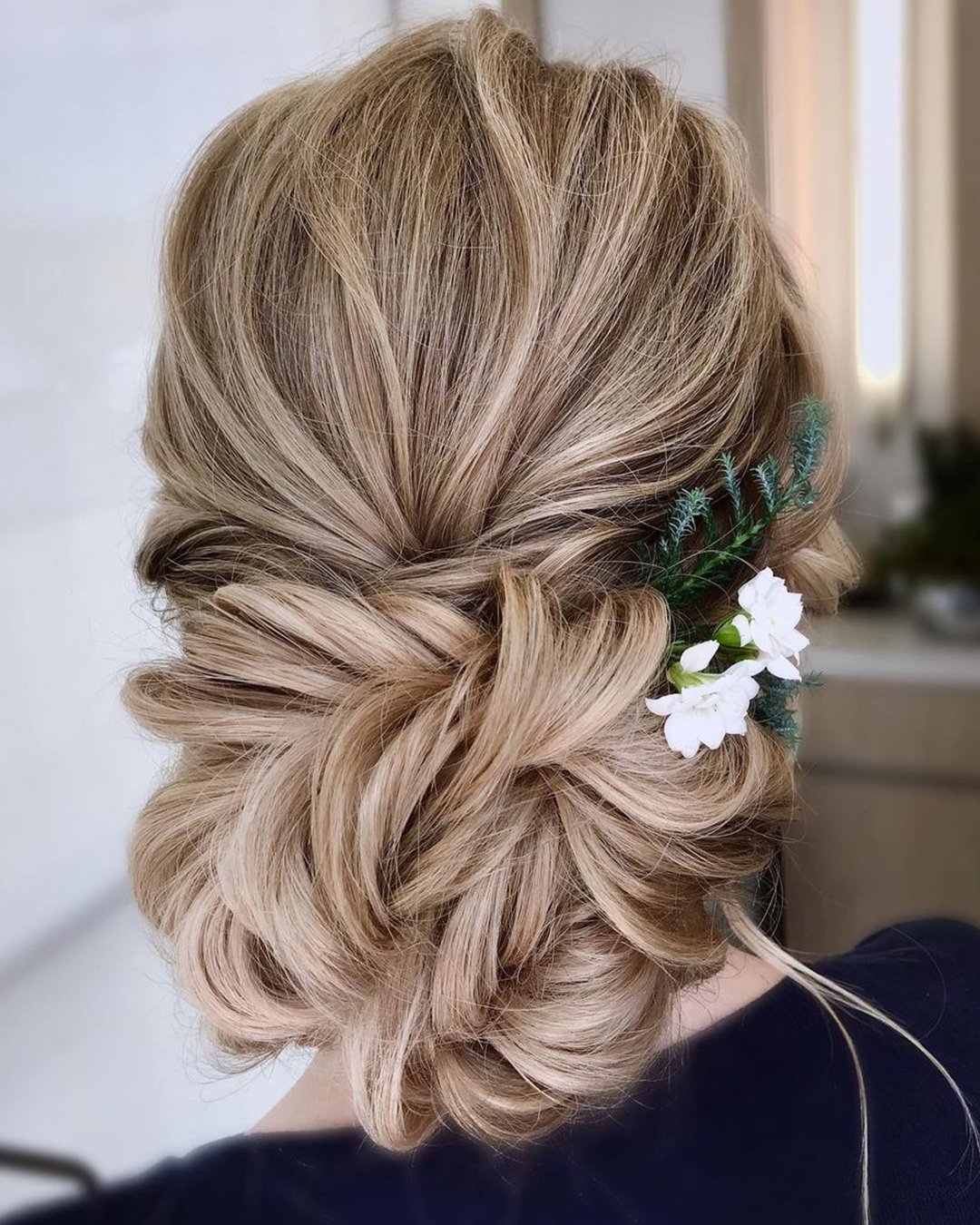 wedding updos for long hair romantic textured updo with flowers katiebstylist