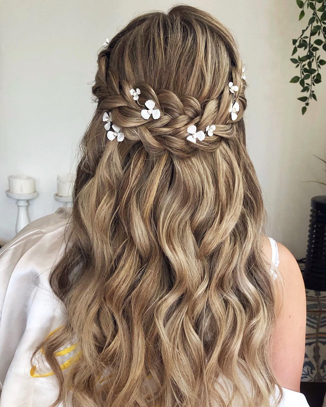 braided wedding hair half up with braids and white flower pins zhanna_syniavska