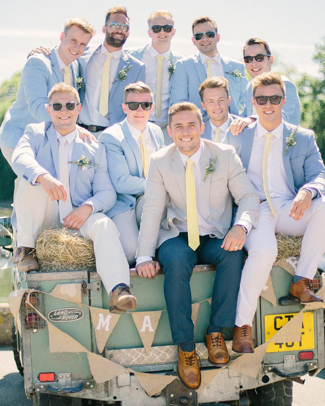 mens wedding attire blue jacket with bow tie tabithastarkphoto