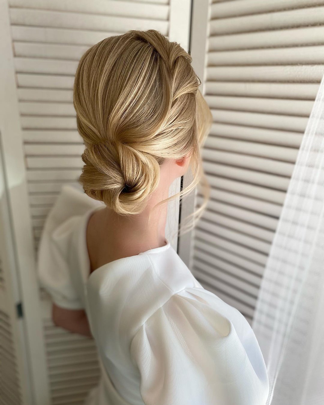 wedding bun hairstyles elegant blonde airy with braided texture art4studio