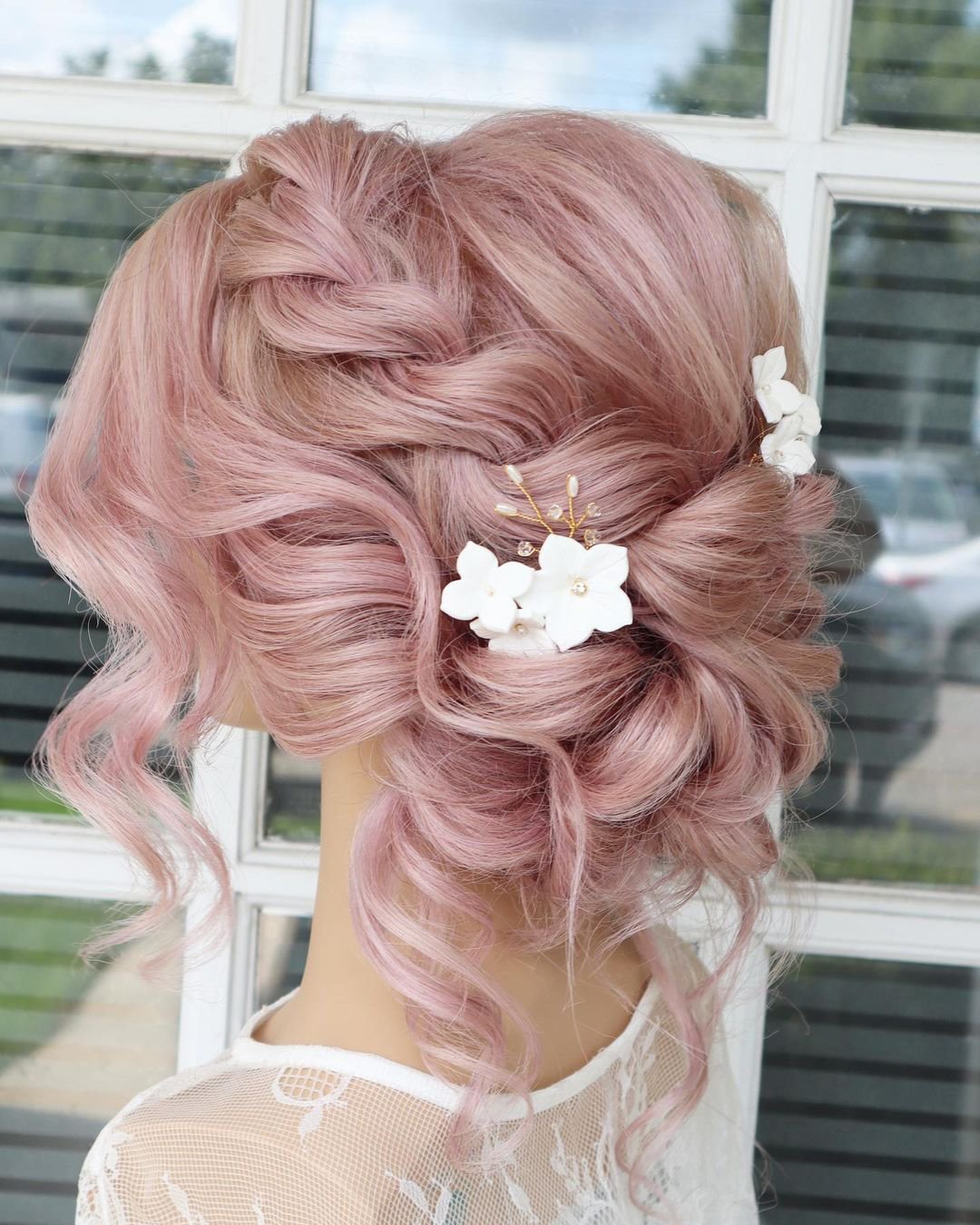 wedding hairstyles with flowers white pins on pink hair reneemarieacademy