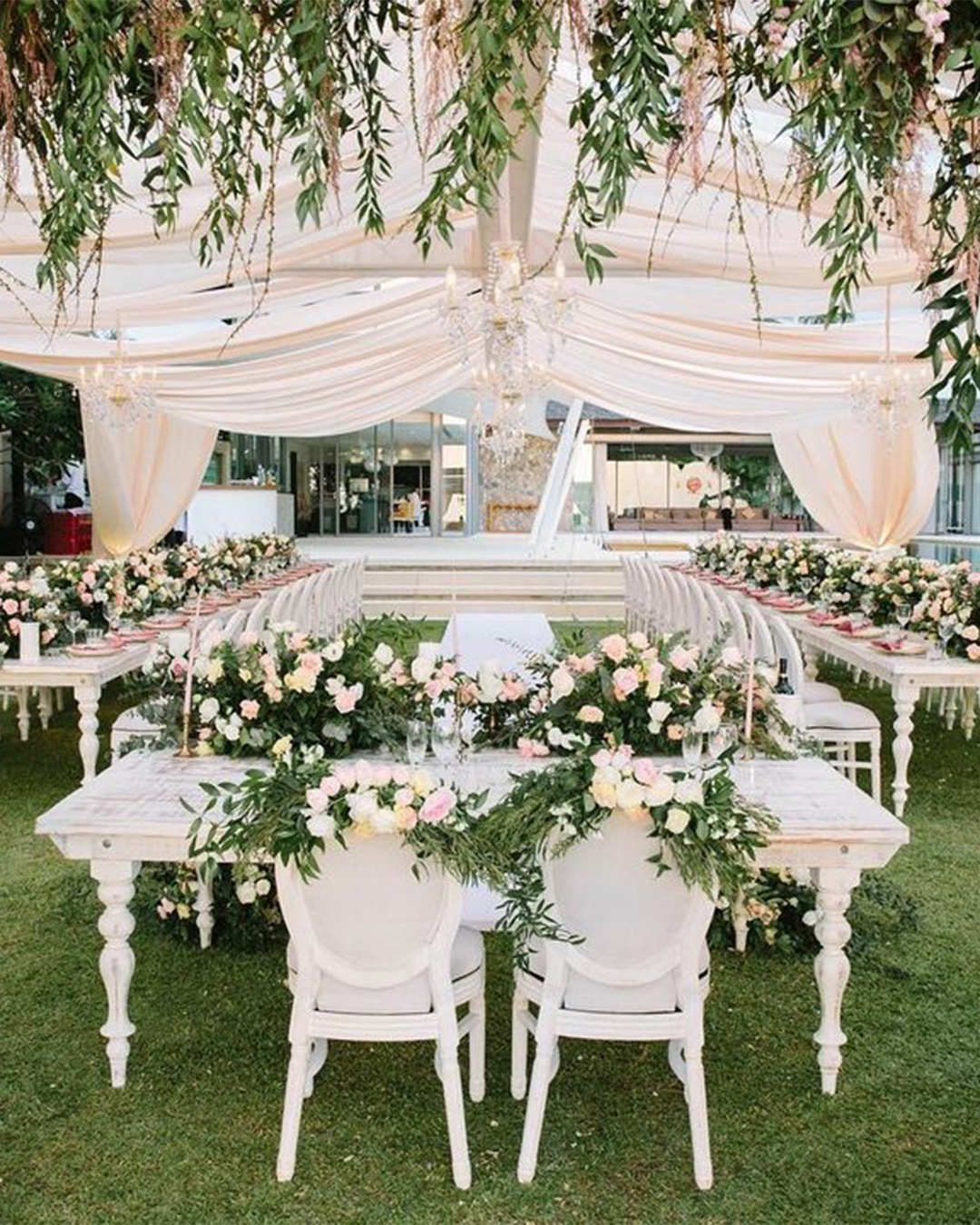wedding tent decorated with natural greenery ideas