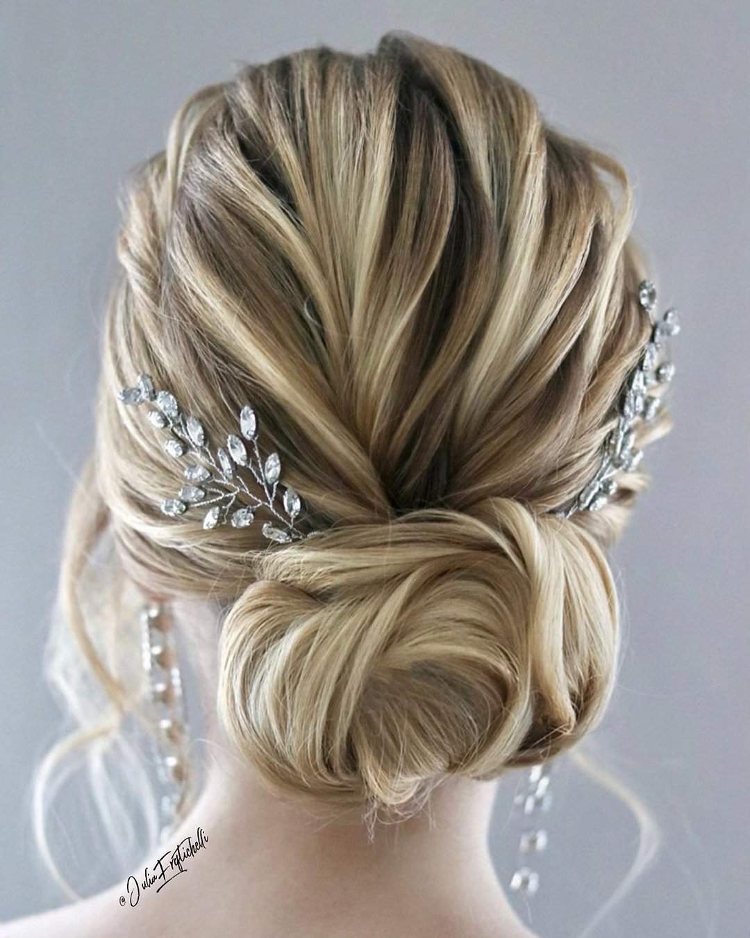 classic wedding hairstyles low messy bun with crystal pins juliafratichelli.bridalstylist