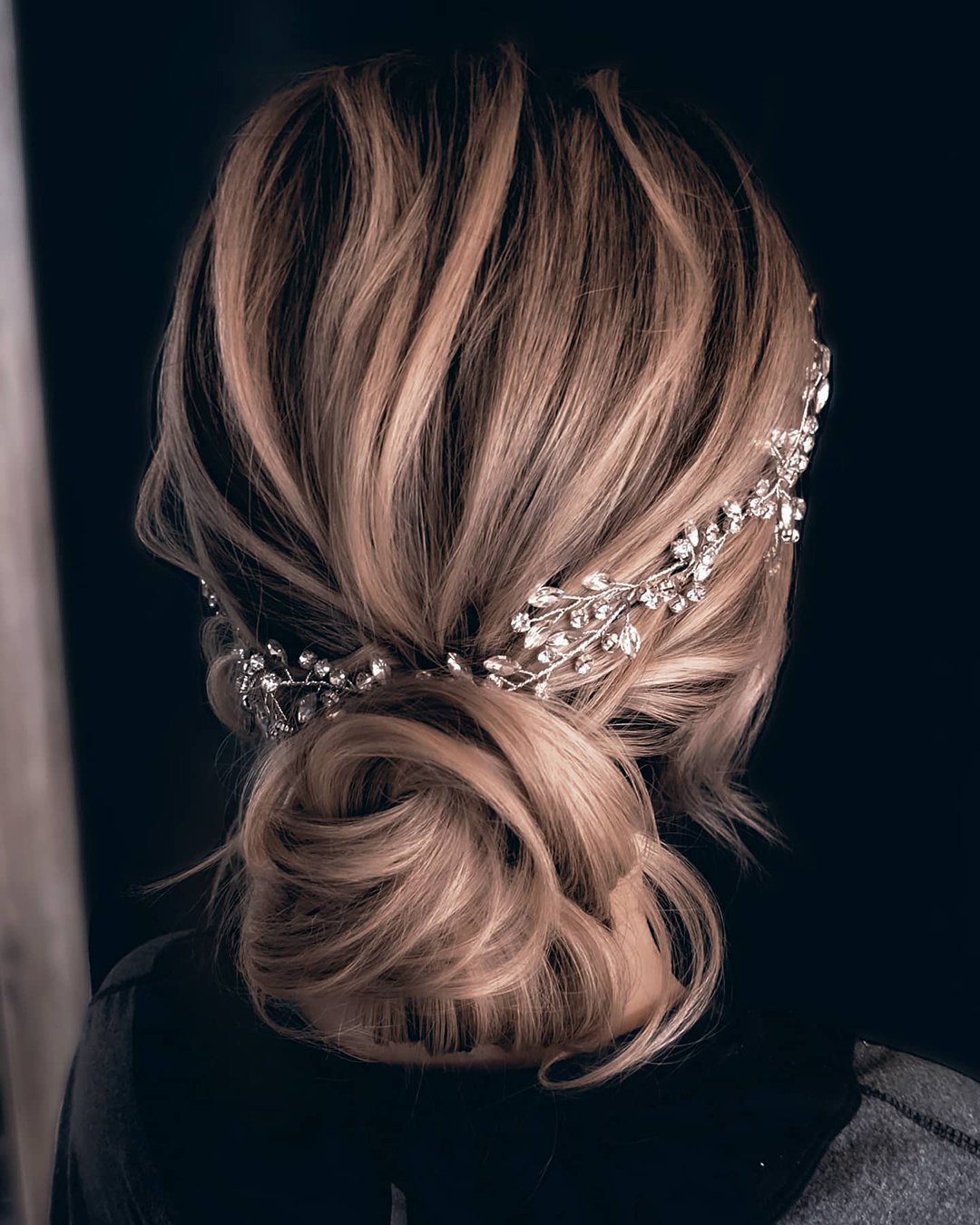 classic wedding hairstyles slightly messy low bun with vine sarahwhair