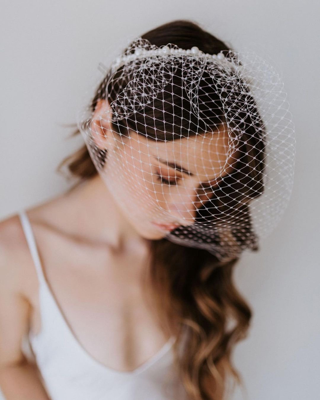 elegant wedding hairstyles loose hair with birdcage veil untamedpetals