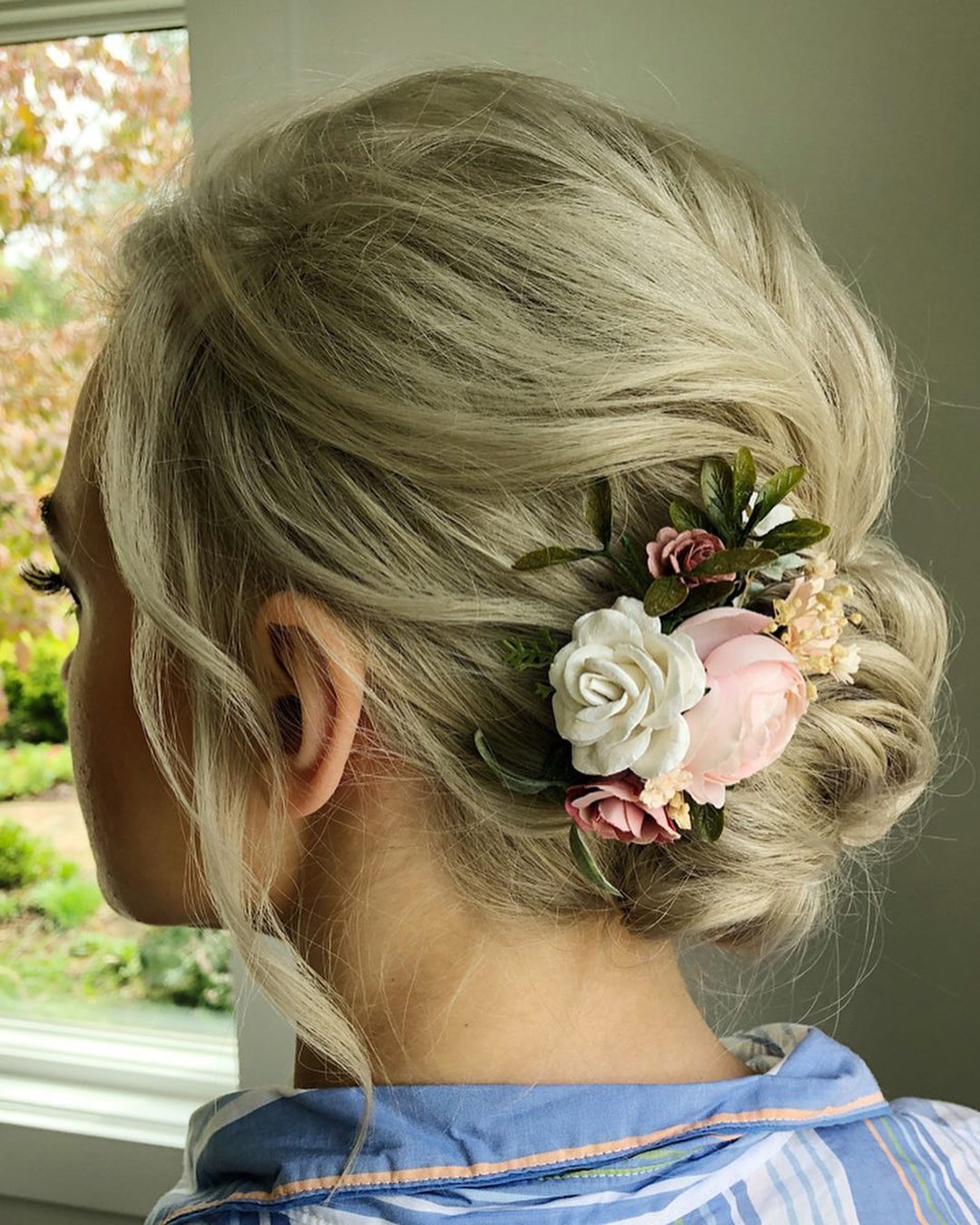 elegant wedding hairstyles simple low bun with flowers krystlewaiviohair