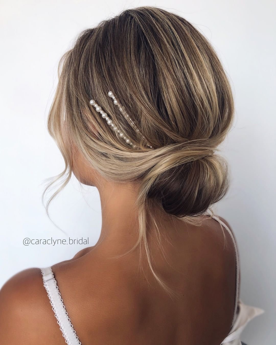 wedding guest hairstyles low simple shignon caraclyne.bridal
