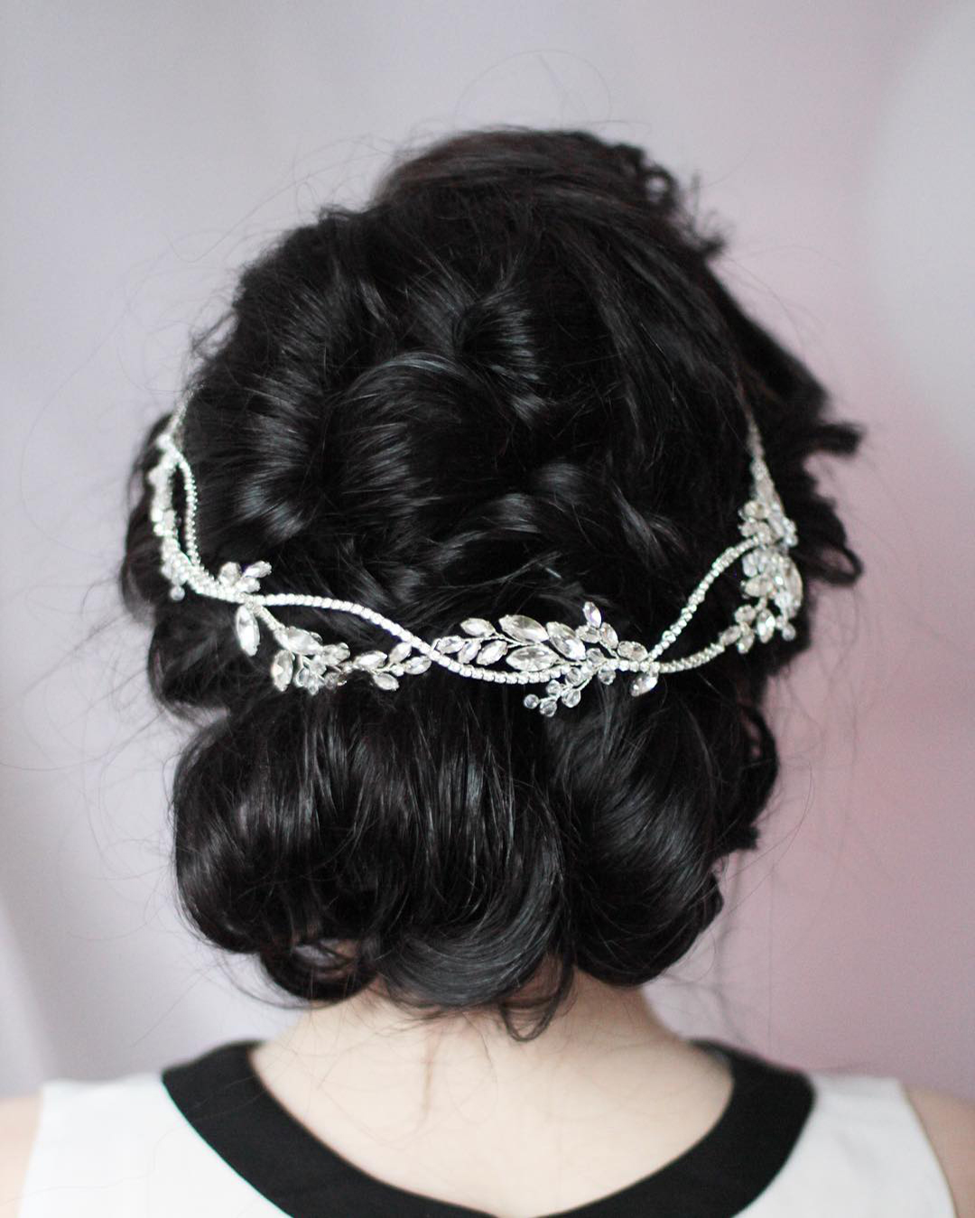 wedding hair accessories messy updo with braid and sparkling pin enzebridal