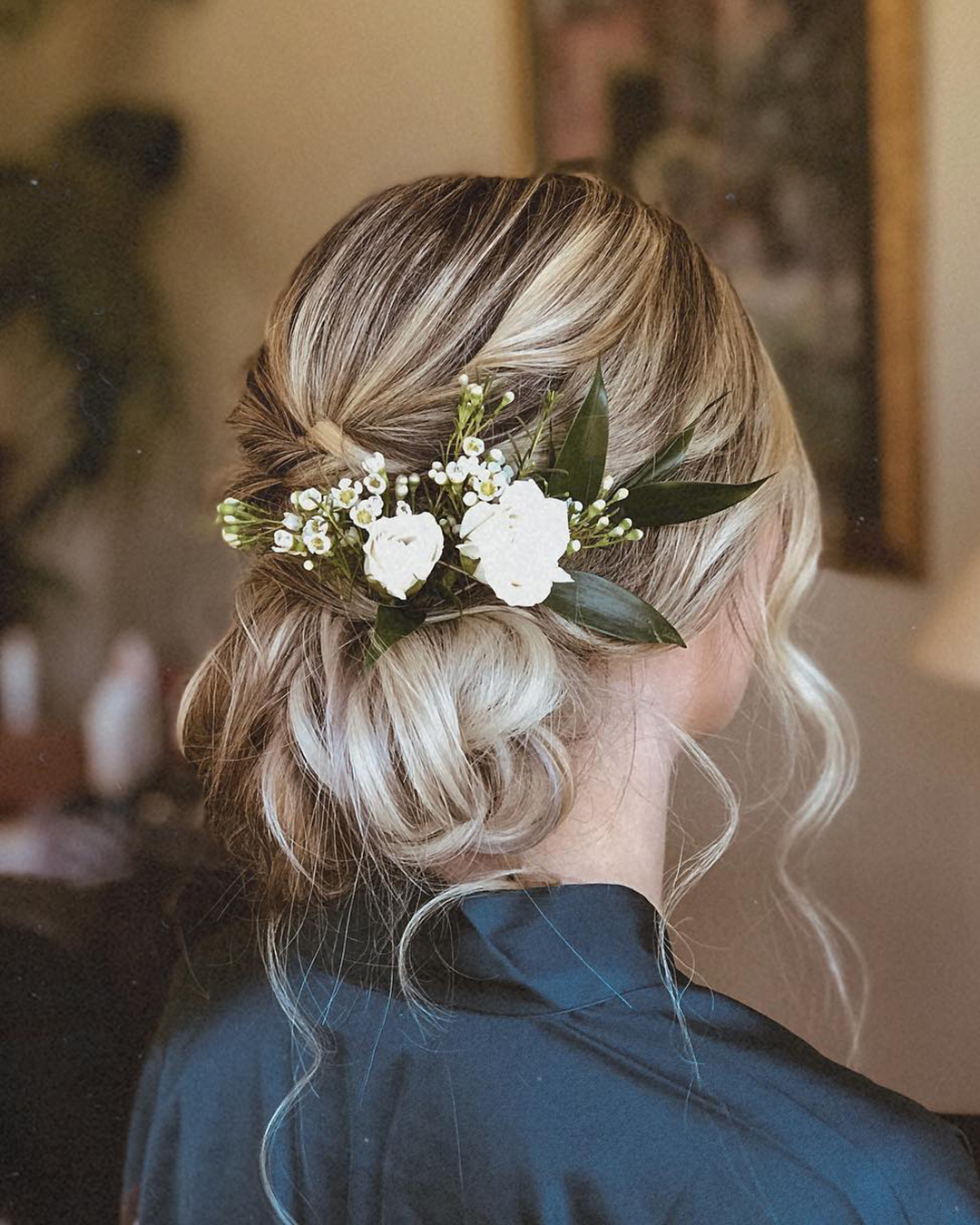 wedding hairstyles messy low bun with flowers babehairbyb