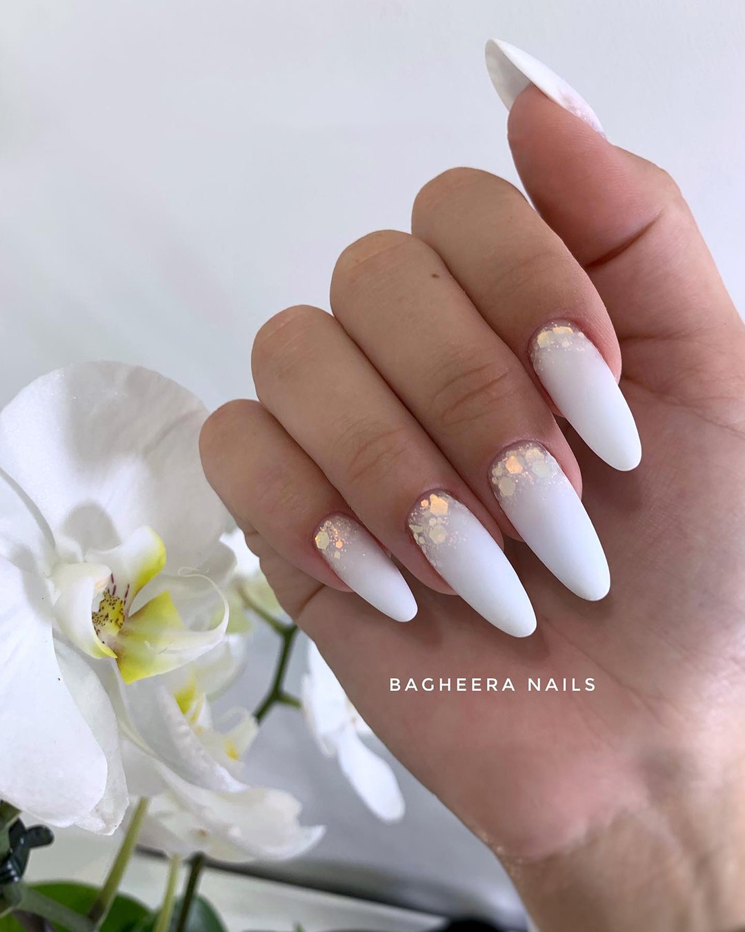 white nail designs long with gold sparkles bagheeranails